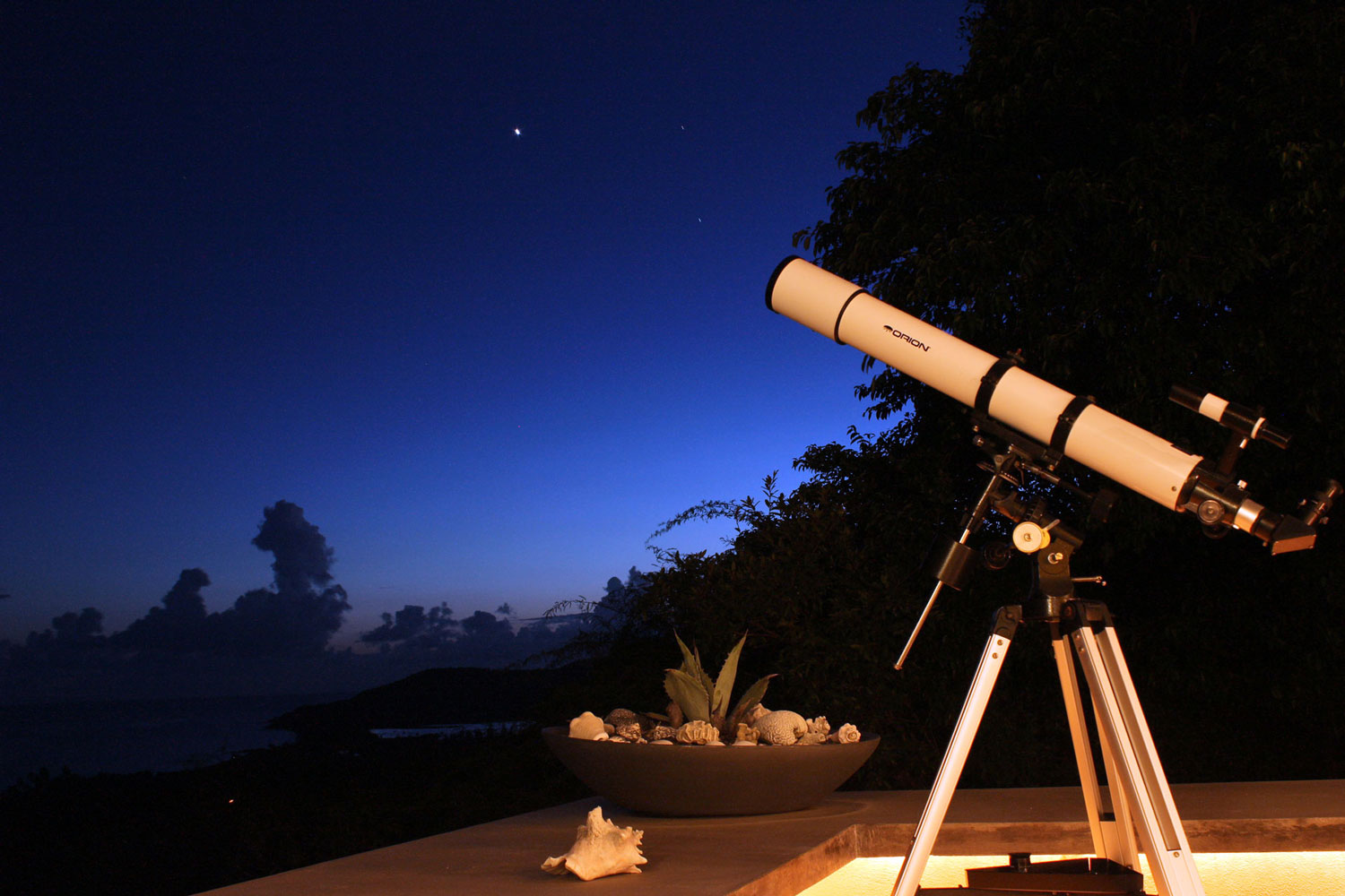 Telescope on deck at night